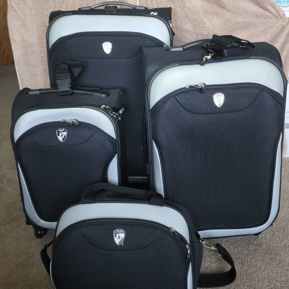 Black 4-Piece Heys Luggage - Used